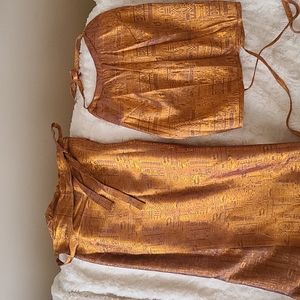 Women's matching long length skirt & matching sexy top.